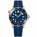 42mm diver watch with blue dial, two-tone metal case, and blue rubber strap